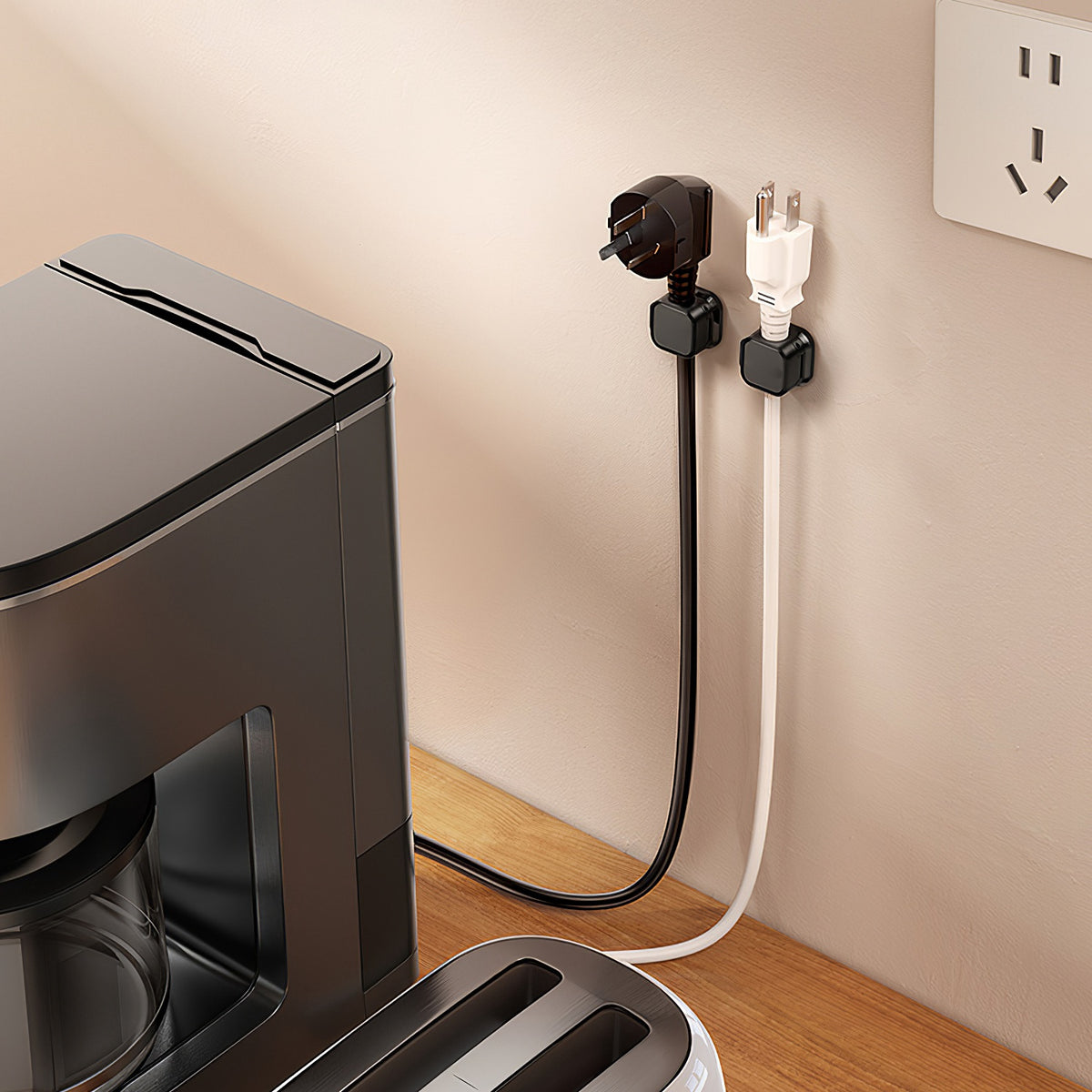 Magnetic cable clips holding cords on desk
