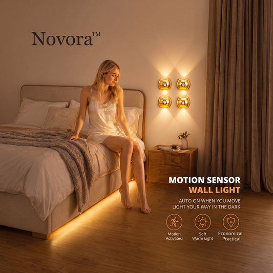 Novora Halo Motion Sconce glowing warm light on wall