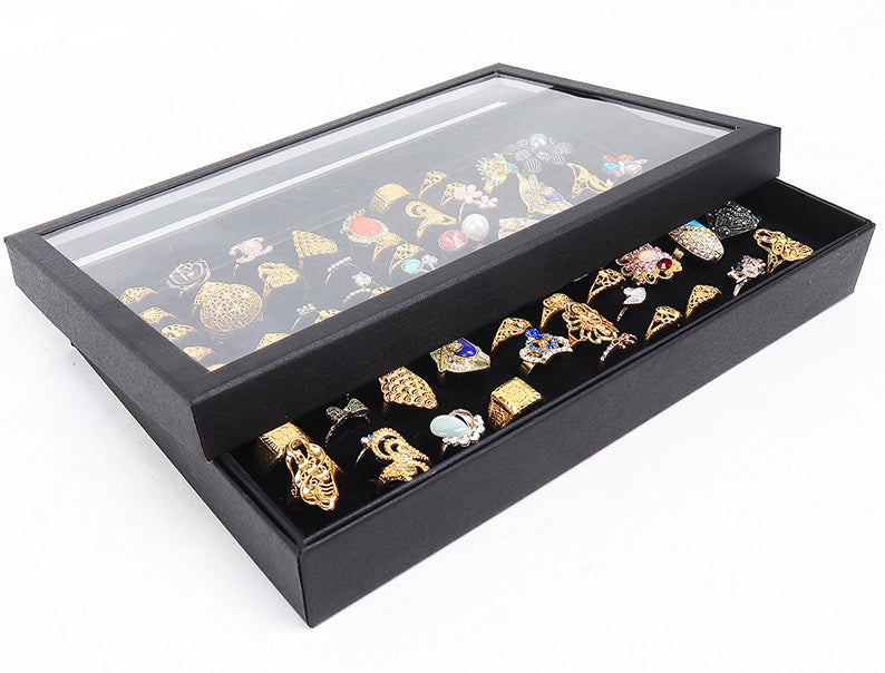 Jewelry ring organizer tray on dresser